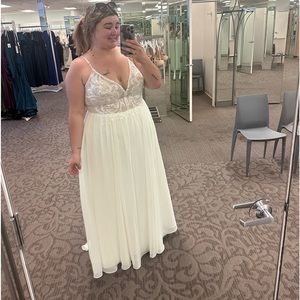 Brand new never worn wedding dress tags still on , moved our wedding